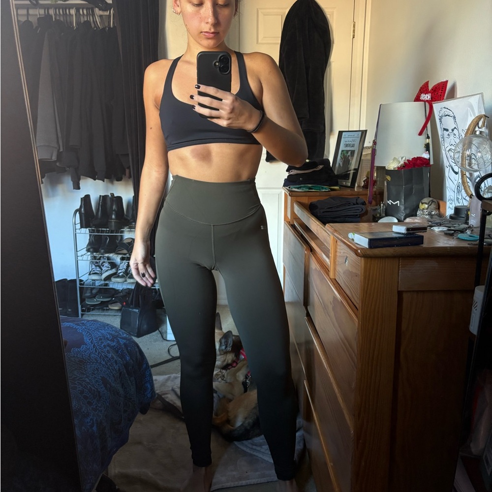 lululemon athletica black sports bra with olive leggings
